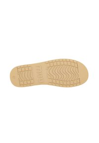 Suola di scarpa in gomma beige con superficie testurizzata. Presenta un motivo a onda e battistrada rettangolari, migliorando aderenza e durata.