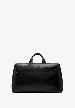 Bolso de cuero negro con forma rectangular, con costuras turquesas, doble asa y una textura lisa y pulida.