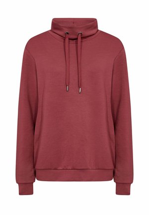 Tamsiai raudonas džemperis su aukštu, sulankstytu apykakle, raišteliais, ilgomis rankovėmis ir laisvo silueto. Pagamintas iš minkšto, lengvo audinio.