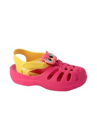Pink plastic clog with yellow accents, featuring an owl-shaped embellishment and ventilation holes. Designed for comfort and breathability.
