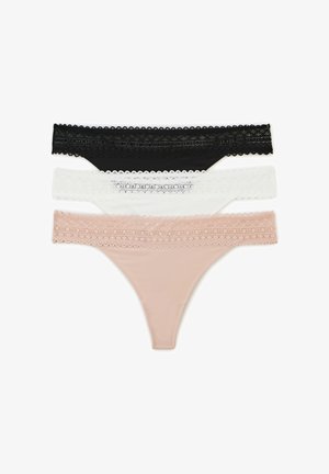 Trois paires de strings : noir, blanc et nude. Chacune dispose d'une bordure en dentelle le long de la taille et est fabriquée en tissu lisse et extensible.