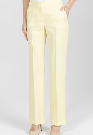 - Spodnie materiałowe