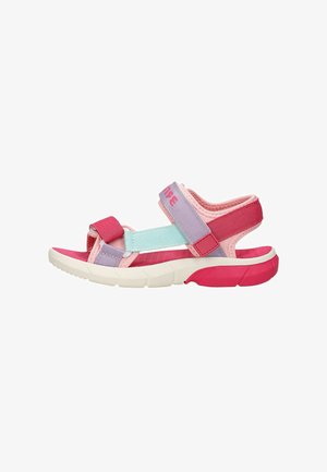 Children's sandals in pink, lavender, and mint with adjustable straps, textured fabric, and a thick white and pink sole.