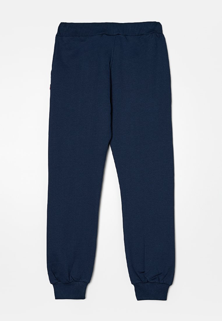 Pantalons de jogging bleu marine en coton doux, avec une taille élastique et des poignets élastiques, d'une texture lisse et sans motifs visibles.