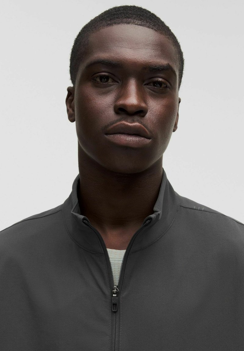 lululemon Zeroed In Track - Training jacket - graphite grey/dark
