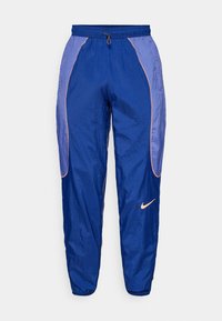 Trainingsbroek - blue void/purple dust/orange pulse