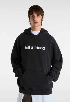Men's black hoodie featuring a front pocket, ribbed cuffs, and the text “tell a friend.” printed in white across the chest. Soft fabric.
