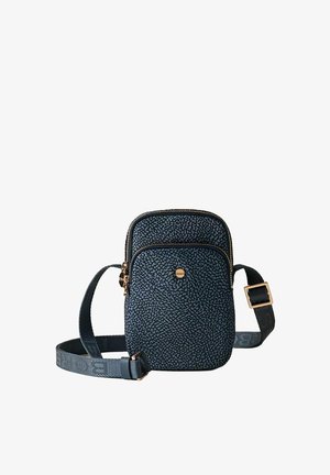 Small navy blue crossbody bag with textured pattern, gold-tone zipper and button details, and adjustable strap with gold buckle.
