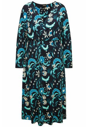 Vestido de estampado floral con un profundo escote en V y mangas largas. Confeccionado en una suave tela de color azul marino, acentuado con flores en turquesa y crema.