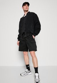 adidas Originals CARGO - Teplákové kalhoty - black