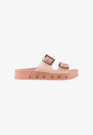 Sandalo rosa tipo slide con due cinturini traslucidi e fibbie metalliche in oro rosa, dotato di suola testurizzata e suola esterna rigata per una migliore aderenza.