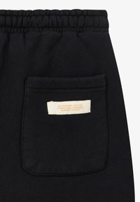 BLKVIS SCRIPT UNISEX - Donji dijelovi trenirke - black