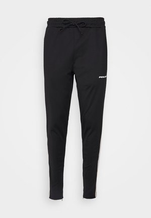 Schwarze Slim-Fit-Jogginghose mit elastischem Bund, Kordelzug, Seitentaschen und kleinem weißen Logo am rechten Oberschenkel.