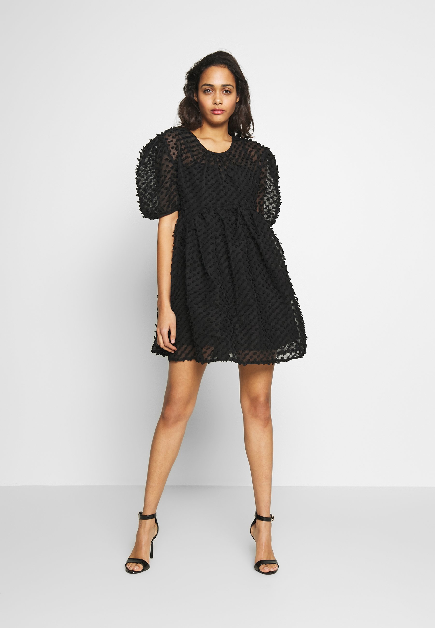 black mini smock dress