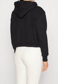Calvin Klein Jeans Mikina na zip - black