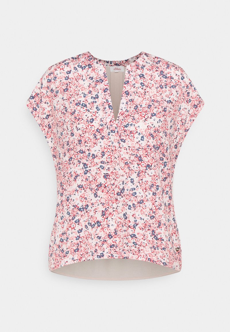 Blusa sin mangas de cuello en V con estampado floral en rojo, rosa y azul sobre un fondo claro, con un dobladillo curvado.