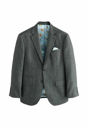 Blazer en tweed gris avec un revers cranté, deux poches avant et une doublure à motif floral bleu. Présente deux boutons et des accents décoratifs aux poignets.