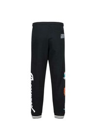 Schwarze Jogginghose mit lockerem Schnitt, ausgestattet mit weißen und bunten Grafiken auf den Beinen, elastischem Bund und gestreiften Bündchen.