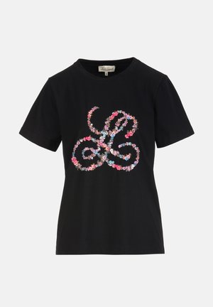 T-shirt noir à manches courtes avec un motif floral coloré formant une forme abstraite en boucle sur le devant.