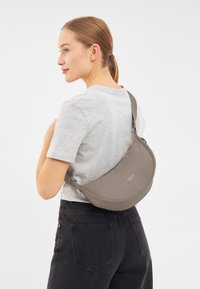 Larkson SOLVEIG SMALL HALF MOON  - Cross body bag - gravel