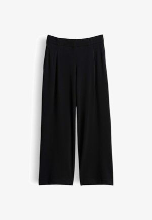 Pantalon noir à jambes larges, taille haute avec des plis sur mesure, présenté à plat sur fond blanc.