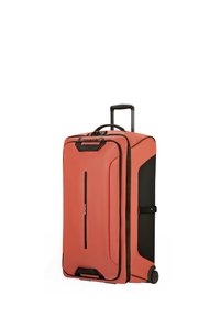 Orange suitcase with black accents, hard-shell design, retractable handle, and smooth wheels for easy maneuverability. Zippered compartments included.