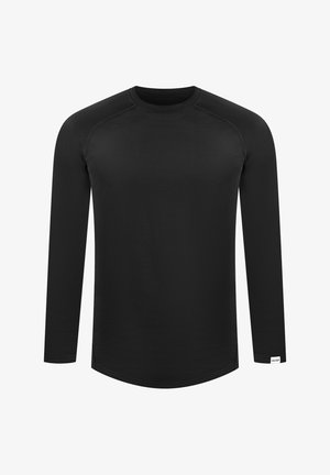Zwarte langmouw shirt van gladde stof; met een ronde hals, raglanmouwen en een gebogen zoom met een wit label aan de zijkant.