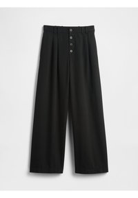 Pantalons larges noirs en tissu léger, dotés d'un zip à boutons avec cinq boutons et de passants de ceinture pour un ajustement réglable.