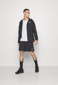 Puma RUN ULTRAWEAVE 7 - Pantalón corto de deporte - black