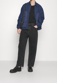 Carhartt WIP Vaqueros baggy - black denim