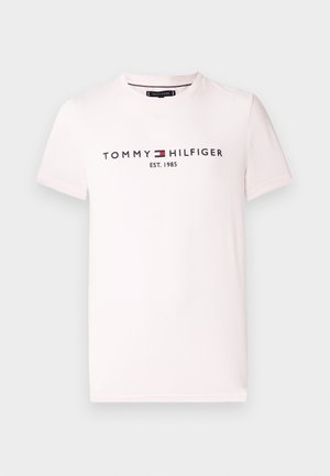 Világos rózsaszín rövid ujjú pamut póló, melyen sötétkék színnel a "TOMMY HILFIGER EST. 1985" felirat olvasható. Egyszerű, díszítetlen kialakítás.