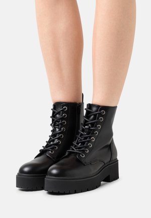 Platform ankle boots - black