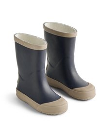 Paar dunkelblaue Gummistiefel mit beigen, strukturierten Sohlen und Besatz, die nebeneinander auf weißem Hintergrund stehen.