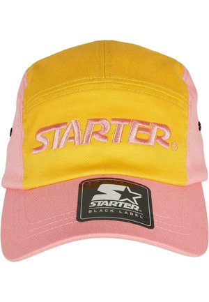 Two-tone cap with a yellow front and pink visor. Features embroidered "STARTER" logo and a black label tag on the side. Cotton material.