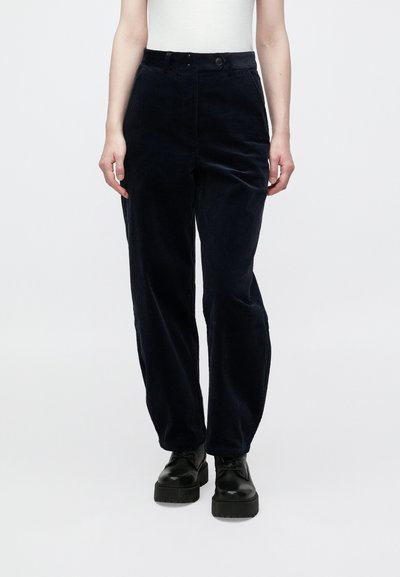 Navy corduroy trousers with a straight fit, featuring subtle texture, side pockets, and a button closure at the waistband.