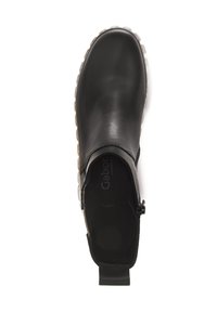 Botte noire en cuir à enfiler avec bout rond, semelle texturée blanche, fermeture éclair sur le côté et languette de tirage à l'arrière en haut.