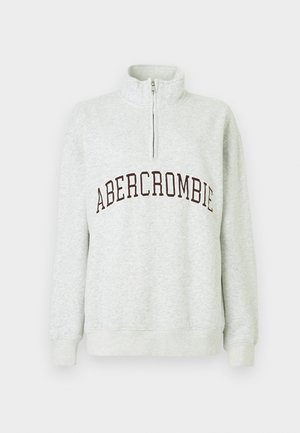 Light gray quarter-zip sweatshirt with "ABERCROMBIE" printed in dark letters across the chest, ribbed cuffs, and waistband.