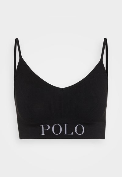 Čierny rebrovaný bralet s tenkými ramienkami a dizajnom vo výstrihu do V. Má slovo "POLO" v kontrastnej bielej farbe na elastickom páse.