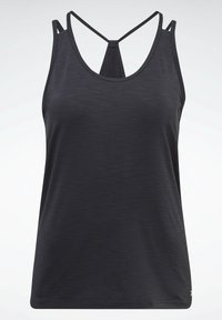 Débardeur de sport noir pour femme avec fines bretelles et un design unique croisé dans le dos sur un fond clair.