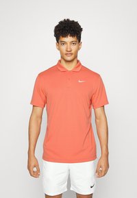 Nike Performance SOLID - Polo - madder root/white
