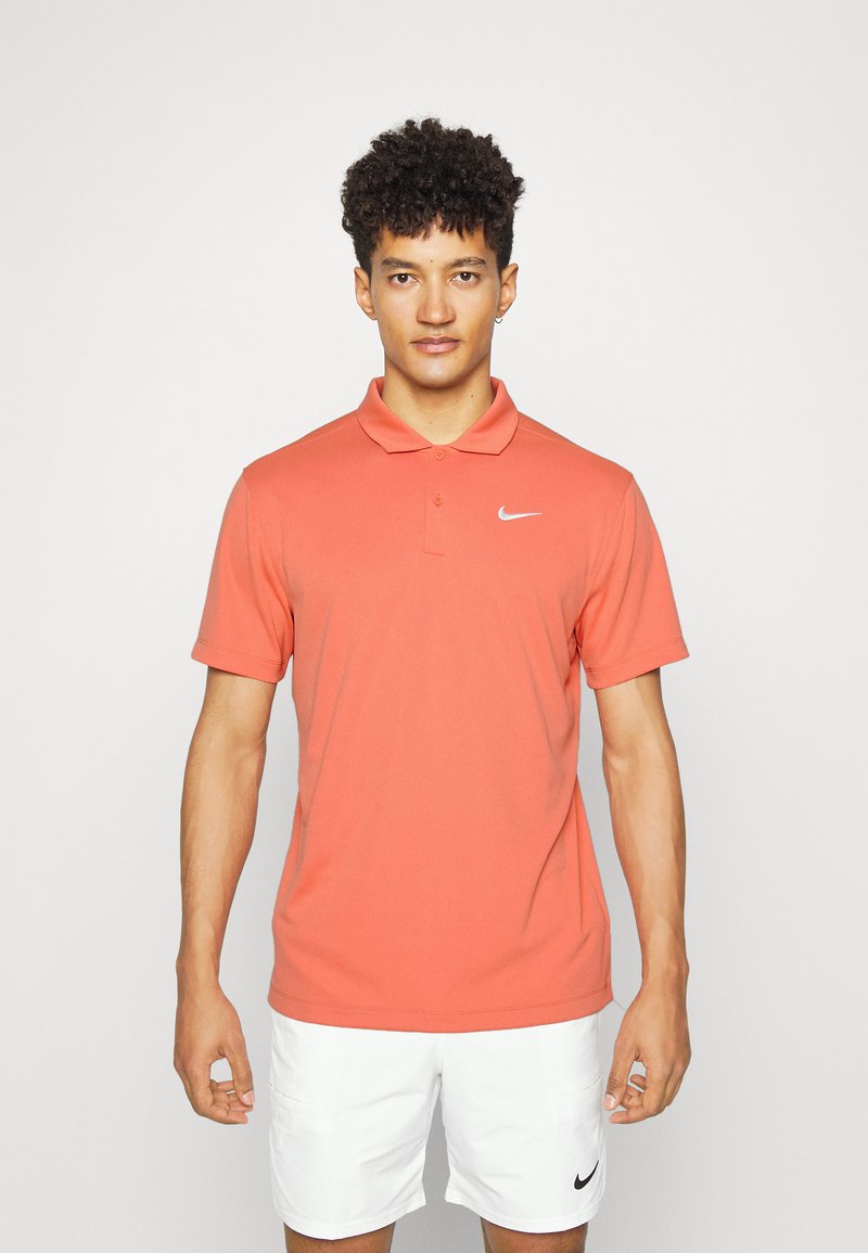 Nike Performance SOLID - Polo - madder root/white