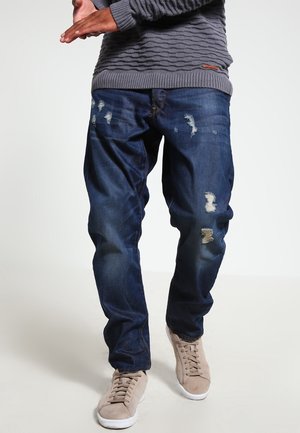 Jeans Tapered Fit - light-blue denim