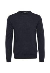 Granatowy sweter z okrągłym dekoltem wykonany z miękkiego materiału. Posiada długie rękawy oraz ściągacze przy mankietach i dole. Prosty fason, bez widocznych wzorów lub ozdób.