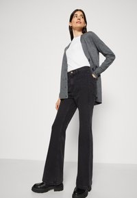 GAP 70S TAYLORSON - Alt laienevad teksad - basic black