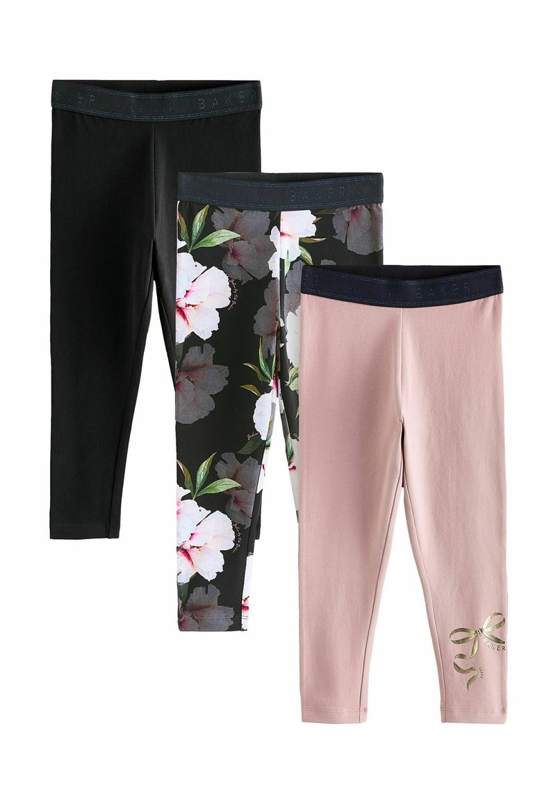 Trois paires de leggings : noirs, à motif floral sur fond noir, et rose clair avec un détail en ruban doré. Tissu extensible et taille élastique.