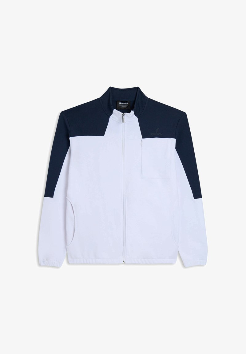 Chaqueta blanca con cremallera y paneles superiores en azul marino. Cuenta con cuello alto, bolsillos laterales y un bolsillo en el pecho. Hecha de tela suave.