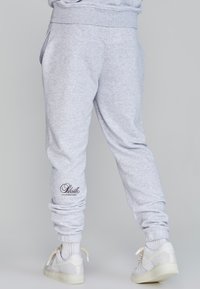 LOGO JOGGERS - Tepláky - snow marl