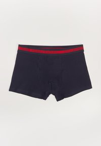 Granatowe bawełniane bokserki z czerwoną elastyczną gumką z napisem "Nautical Divers" oraz płaskimi szwami dla wygody.