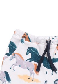 Weisse Baumwollshorts mit mehrfarbigem Pferdeprint. Mit einem dunklen Bund und Zugband, seitlichen Taschen und weichem Material.