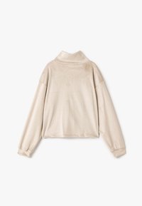 Beige cropped pullover med høj krave, blød tekstur, lange ærmer og løs pasform. Glat stof med minimalistisk design og ingen synlige metaldele.